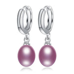 Genuine sterling silver dangle earrings with natural freshwater pink pearls, elegant pearl jewelry for women.