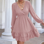 Elegant pink A-line chiffon dress with polka dots, featuring a V-neck, waist ruffle, and long balloon sleeves from Laneberg's 2023 fashion collection.