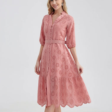 Elegant floral cotton dress with v-neck and ruffled details for stylish women's summer fashion.