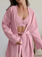 Soft pink waffle knit 3-piece loungewear set with open front cardigan, crop top, and wide-leg shorts.