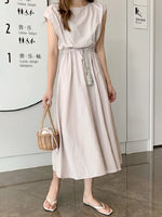 Elegant cotton maxi dress with short sleeves and drawstring waist for versatile summer style