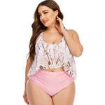 Stylish plus-size floral-print swimsuit with a fitted pink top and high-waist pink bottoms, ideal for flattering curves.