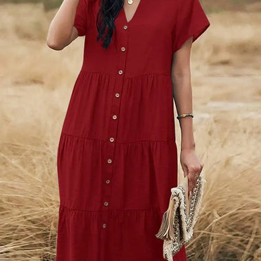 Elegant red button-down dress with ruffled midi silhouette, perfect for summer strolls through the wheat field