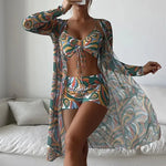 Colorful abstract printed tankini swimsuit set with cover-up for stylish beach or pool attire